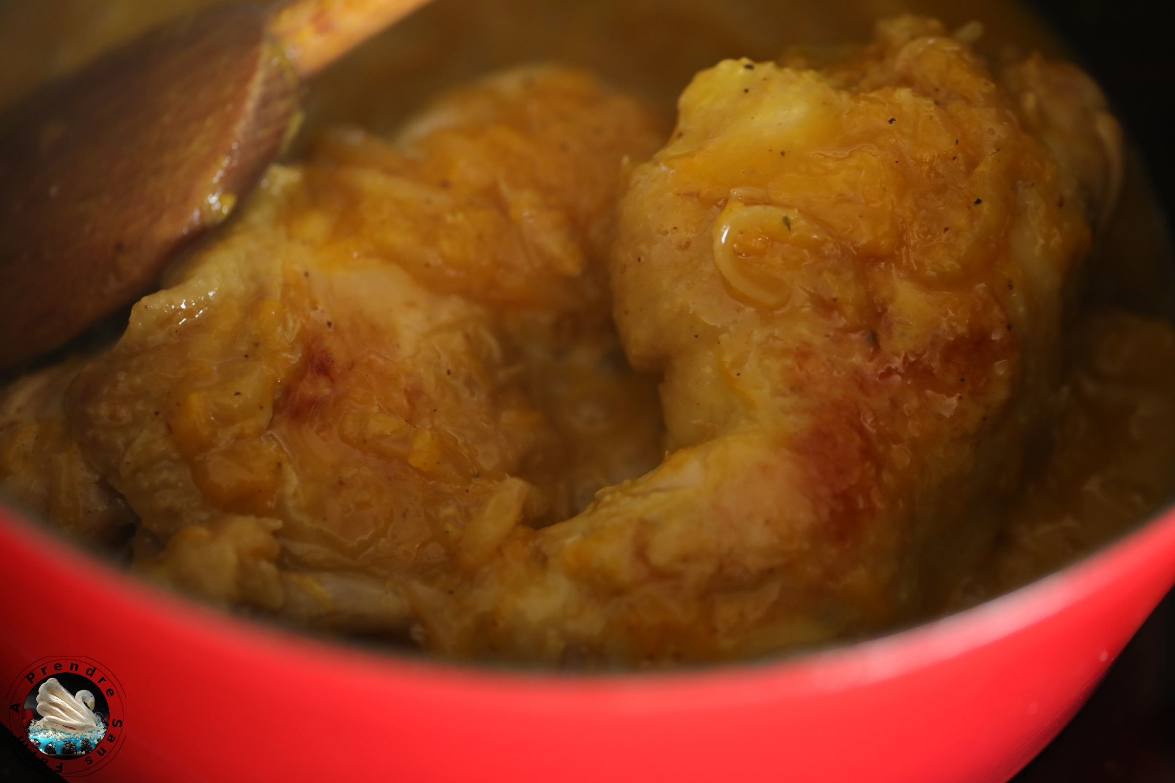 Cocotte de cuisses de poulet à l'orange et au curry 