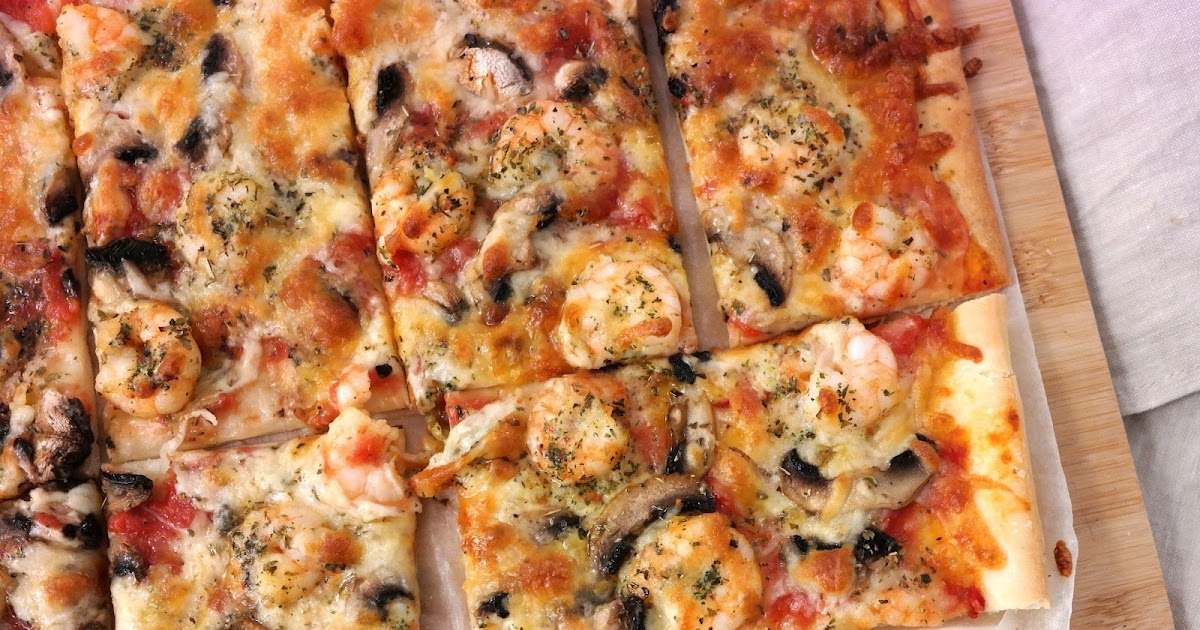 PIZZA AUX CREVETTES ET CHAMPIGNONS