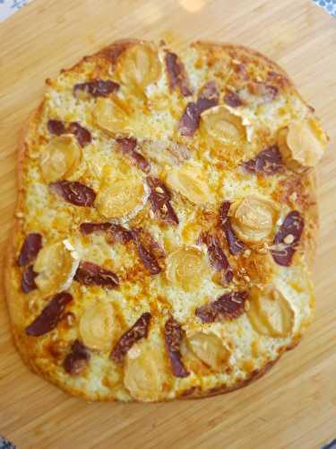 Pizza aux fromages et magret