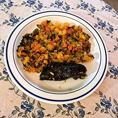 Boudins noirs et macédoine de légumes au curry et à l’ail noir